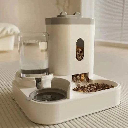 Pet feeding and water station with a glass of water and food on a light surface.